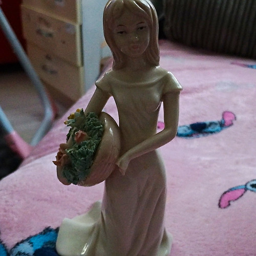Pink ceramic girl figurine - pink,